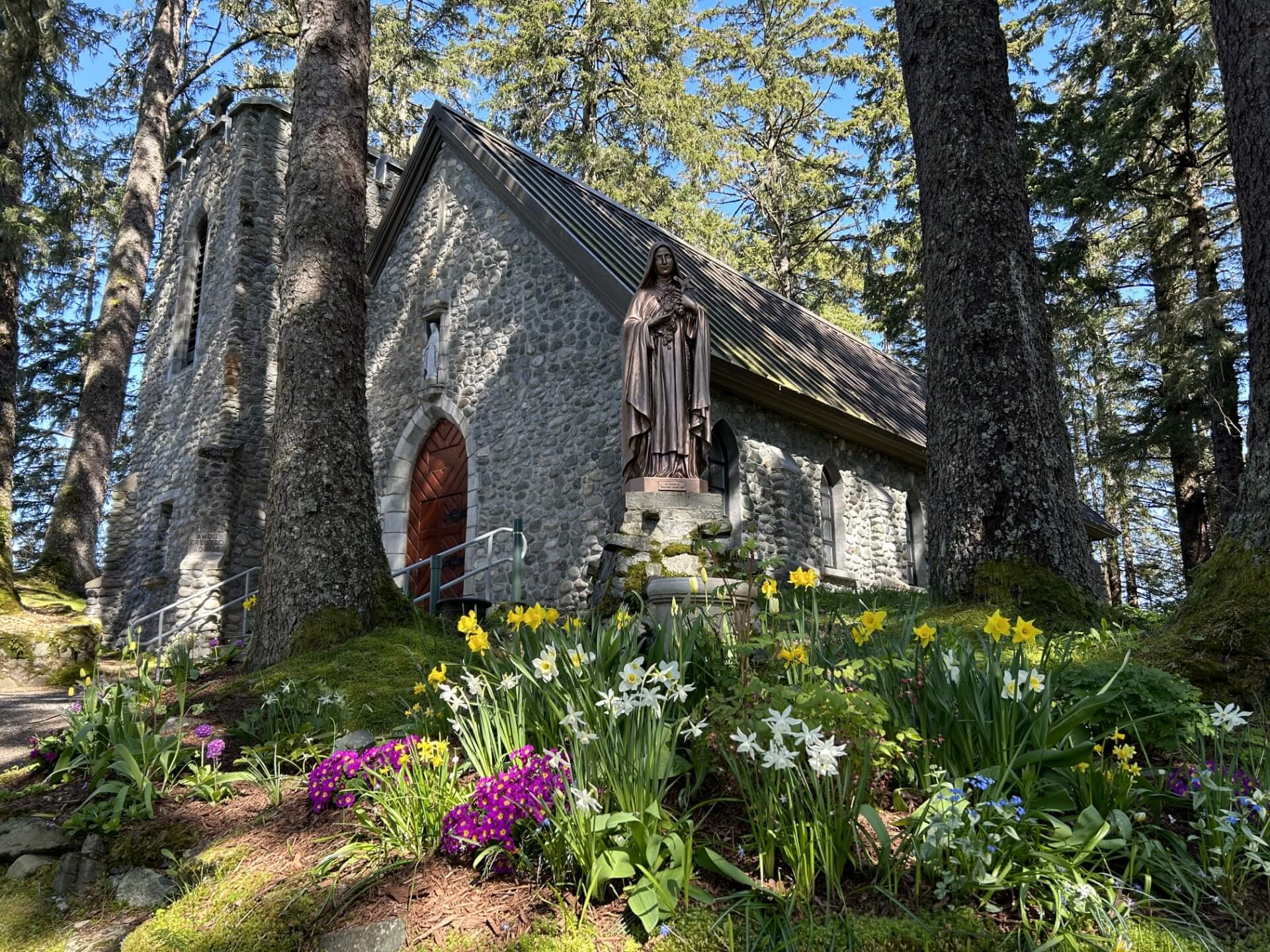 Flowers blooming in front of the Shrine Chapel